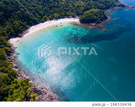 Aerial view seashore with mountains at Phuket Thailand, Beautiful seacoast view at open sea in summer season, Nature recovered Environment and Travel background Aerial view seashore with mountains at Phuket Thailand, Beautiful seacoast view at open sea in summer season, Nature recovered Environment and Travel background 106316436