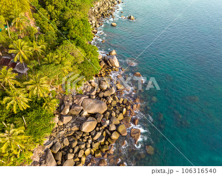 Aerial view seashore with mountains at Phuket Thailand, Beautiful seacoast view at open sea in summer season, Nature recovered Environment and Travel background Aerial view seashore with mountains at Phuket Thailand, Beautiful seacoast view at open sea in summer season, Nature recovered Environment and Travel background 106316540