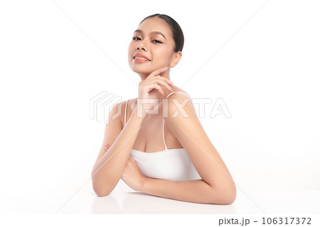 Beautiful young asian woman with clean fresh skin on white background, Face care, Facial treatment, Cosmetology, beauty and spa, Asian women portrait. Beautiful young asian woman with clean fresh skin on white background, Face care, Facial treatment, Cosmetology, beauty and spa, Asian women portrait. 106317372