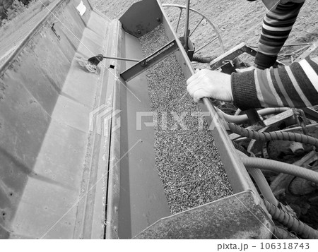 Plowed field by tractor in black soil on open countryside nature Plowed field by tractor in black soil on open countryside nature 106318743