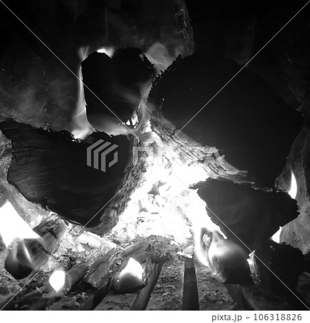 Beautiful flame brown wood dark black coal Beautiful flame brown wood dark black coal 106318826