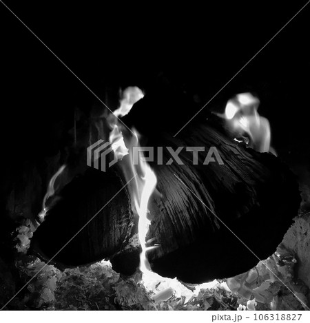 Beautiful flame brown wood dark black coal Beautiful flame brown wood dark black coal 106318827