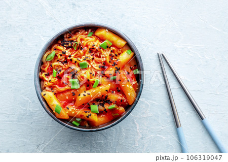 Rabokki, tteokbokki or topokki with ramen, Korean street food, spicy rice cakes Rabokki, tteokbokki or topokki with ramen, Korean street food, spicy rice cakes 106319047