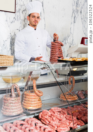 Young cook at butcher store 106322524