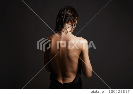 Naked Female back. young wet woman in the towel Naked Female back. young wet woman in the towel 106325817