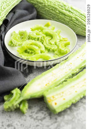 Bitter gourd placed on a cement board. 106326029