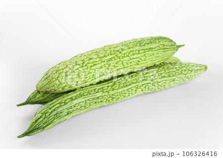 Bitter gourd on a white background board. 106326416