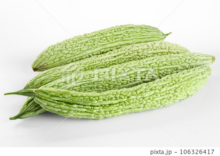Bitter gourd on a white background board. Bitter gourd on a white background board. 106326417