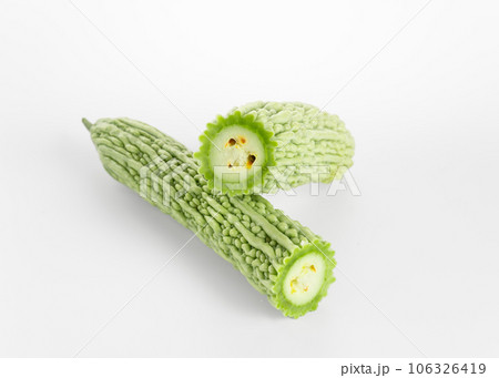 Bitter gourd on a white background board. Bitter gourd on a white background board. 106326419