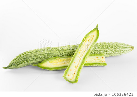 Bitter gourd on a white background board. Bitter gourd on a white background board. 106326423