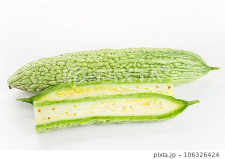 Bitter gourd on a white background board. Bitter gourd on a white background board. 106326424