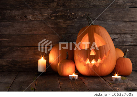 Halloween pumpkin and candles Halloween pumpkin and candles 106327008