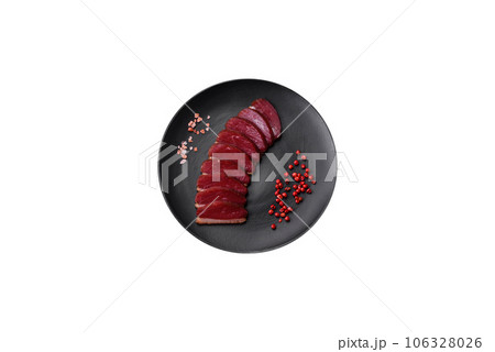 Delicious duck fillet smoked or grilled with spices and salt 106328026