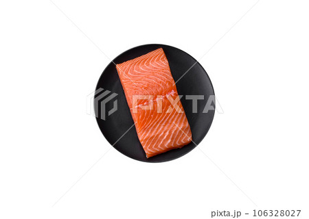 Fresh raw salmon red fish fillet with salt and spices Fresh raw salmon red fish fillet with salt and spices 106328027