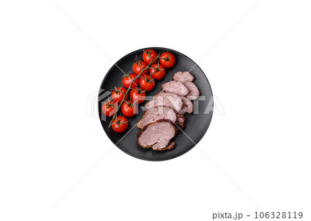 Delicious beef steak with salt, spices and herbs on a ceramic plate 106328119