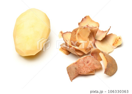 peeled raw potatoes close-up, the object is isolated on a white background peeled raw potatoes close-up, the object is isolated on a white background 106330363