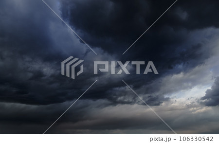 storm sky, dark dramatic clouds during thunderstorm, rain and wind, extreme weather, abstract background 106330542