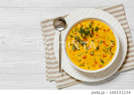 Beer cheese soup with vegetables and thyme Beer cheese soup with vegetables and thyme 106331234