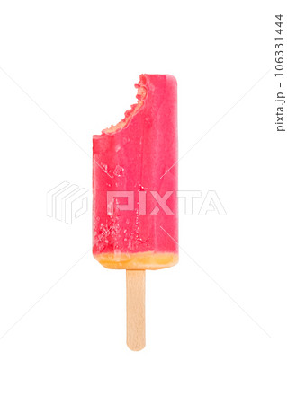 Ice cream on a stick with a bite mark isolated on a white background. Ice cream or fruit ice isolated on a white background. Yellow, orange and red frozen juice on a stick. Vertical ice cream banner 106331444