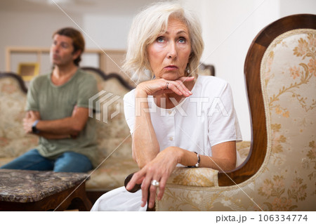 Mature couple quarreling at home, relationship problems 106334774