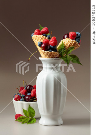 Fresh berries in waffle cones. Fresh berries in waffle cones. 106340318