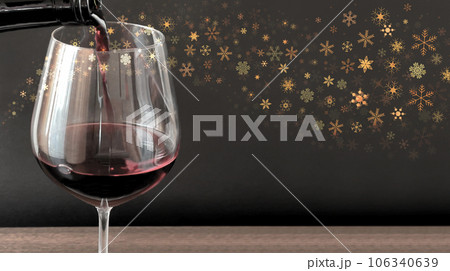 ワイングラスに赤ワインを注ぐ 金のキラキラ結晶 ワイングラスに赤ワインを注ぐ 金のキラキラ結晶 106340639