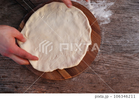 Dought for italian pizza preparation, copy text 106346211