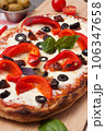 italian pizza with bell pepper, dried tomatoes and olives 106347658