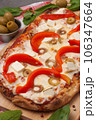 italian pizza with bell pepper, cheese and olives 106347664