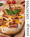 italian pizza with bacon, mozzarella and cheese sauce 106347666