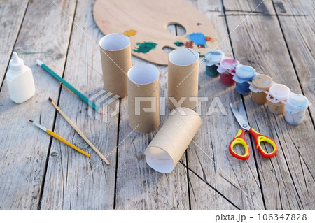 Kids craft bunnies out of recycling toilet paper roll, zero waste concept. Step by step instruction - 1 106347828
