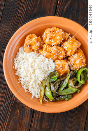 Bowl of orange chicken 106348646