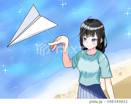海辺で紙飛行機を飛ばす女性 106349922