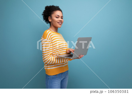 successful afro brunette 20s latin young woman freelancer with laptop 106350381