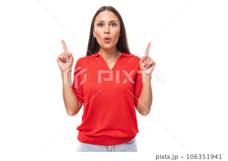 young inspired caucasian brunette woman in a red short sleeve shirt points with her hands to the young inspired caucasian brunette woman in a red short sleeve shirt points with her hands to the 106351941