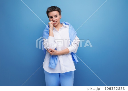 upset pensive young dark haired woman with short haircut upset pensive young dark haired woman with short haircut 106352828