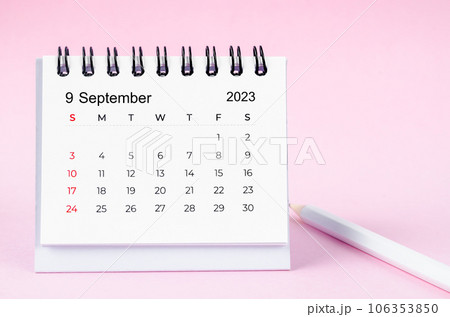 The September 2023 and pencil desk calendar on pink color background. The September 2023 and pencil desk calendar on pink color background. 106353850