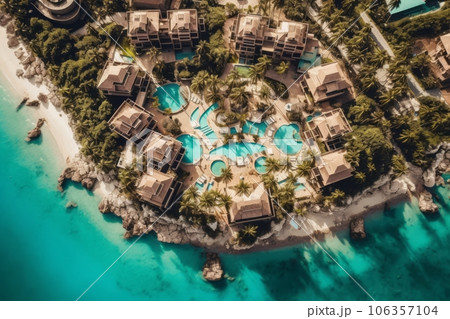 Aerial shot of a luxurious beach resort on tropical island, featuring stunning infinity pools, private villas, and pristine landscapes, enticing viewers to indulge in an idyllic escape. Generative AI 106357104