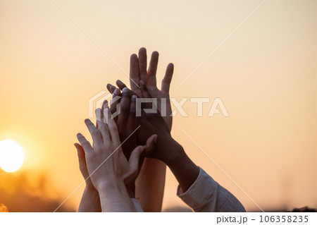 United in Friendship: Multi-Racial Hands High-Five 106358235
