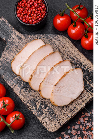 Delicious juicy grilled chicken fillet with salt, spices and herbs 106359917