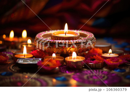Diwali celebration. Diya oil lamps on dark background. Generative AI Diwali celebration. Diya oil lamps on dark background. Generative AI 106360379