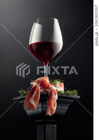 Prosciutto with rosemary and red wine. 106360507