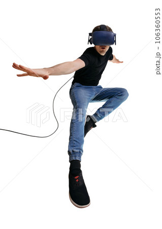 Casual young man in VR simulator finding himself a superhero.  106360553