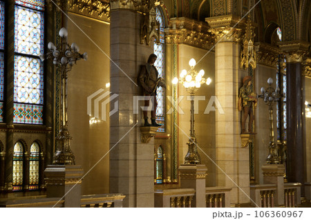 BUDAPEST, HUNGARY - MARCH 03, 2019: Gallery with lots of gold, marble and sandstone inside the Budapest Parliament building, the seat of the government of Hungary BUDAPEST, HUNGARY - MARCH 03, 2019: Gallery with lots of gold, marble and sandstone inside the Budapest Parliament building, the seat of the government of Hungary 106360967