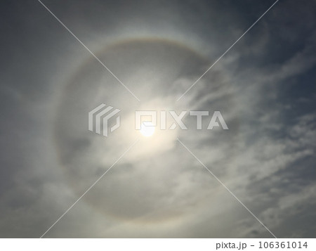 Sun with circular rainbow Sun with circular rainbow 106361014