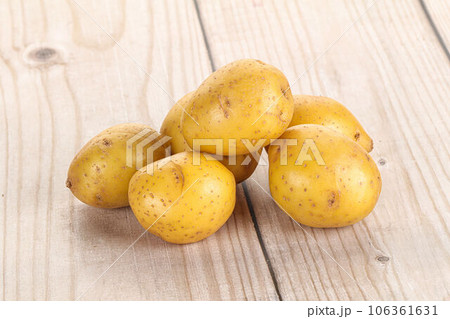 Raw young baby potato heap Raw young baby potato heap 106361631