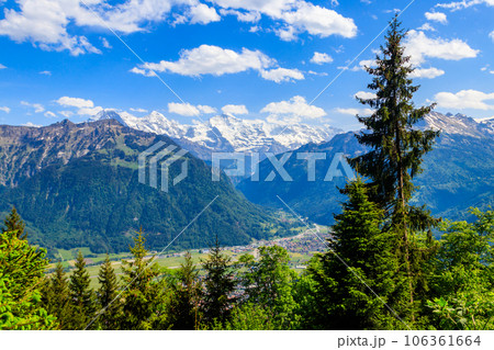Breathtaking aerial view of Interlaken and Swiss Alps from Harder Kulm viewpoint, Switzerland Breathtaking aerial view of Interlaken and Swiss Alps from Harder Kulm viewpoint, Switzerland 106361664