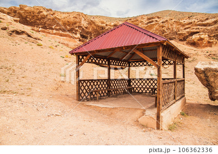 Wooden gazebo for tourists in the Charyn canyon in the Almaty region of Kazakhstan Wooden gazebo for tourists in the Charyn canyon in the Almaty region of Kazakhstan 106362336