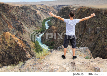 Man travels through the national parks of Central Asia, he is delighted with the nature of Kazakhstan Man travels through the national parks of Central Asia, he is delighted with the nature of Kazakhstan 106362350