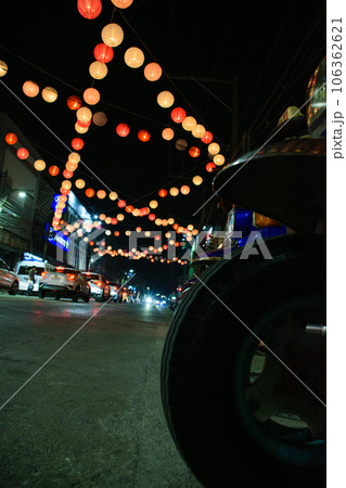 Traffic with tuk tuk wheel in the night of Bangkok. Traffic with tuk tuk wheel in the night of Bangkok. 106362621